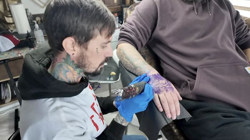 Tattoo artist plans convention to break stigma around ink and mental health