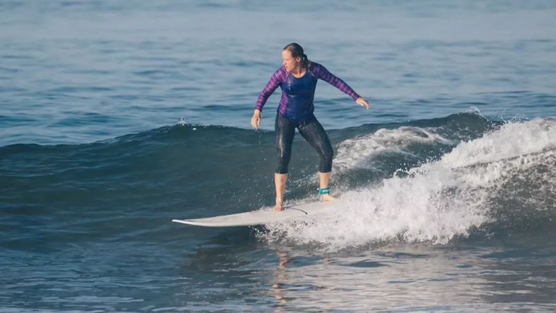 Surfing offers healing through exposure, belonging, and awe.